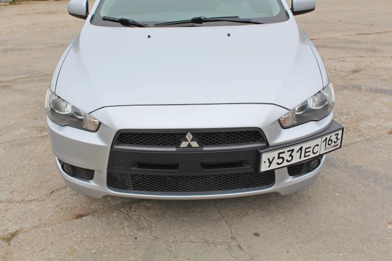Бампер mitsubishi lancer 2010