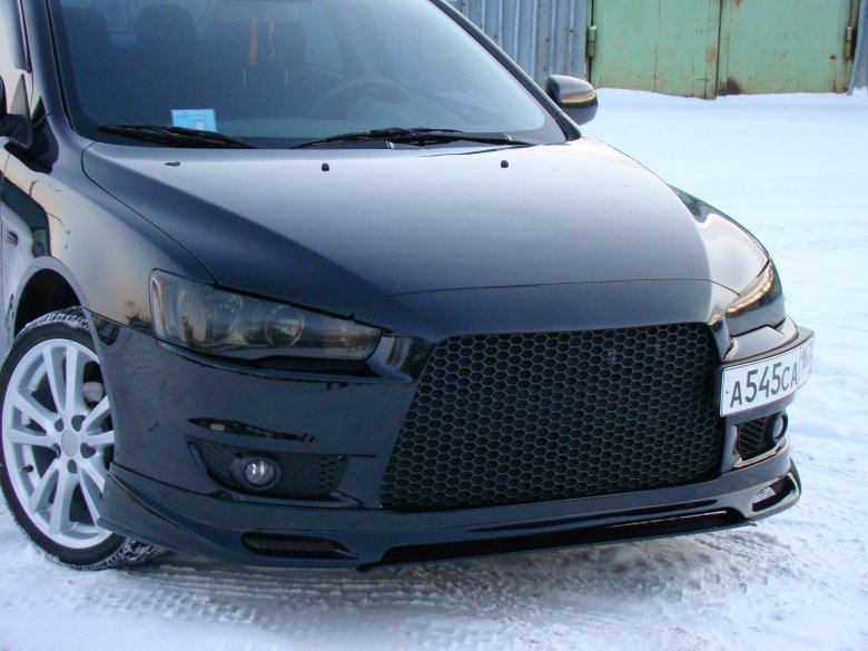 Передний бампер лансер 10