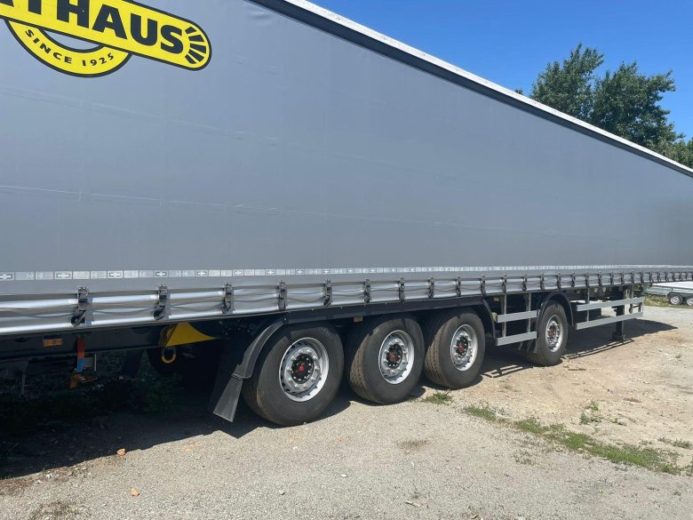 Шторный полуприцеп шмитц