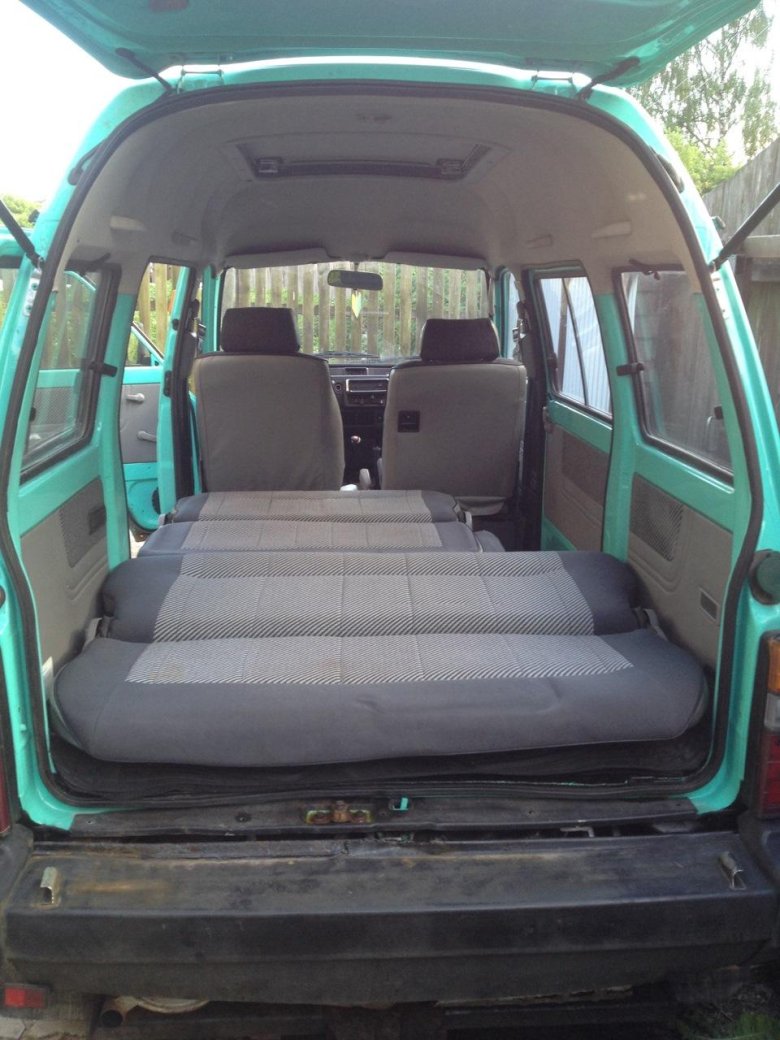 Субару доминго салон