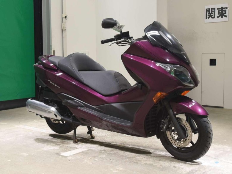 Макси скутер хонда