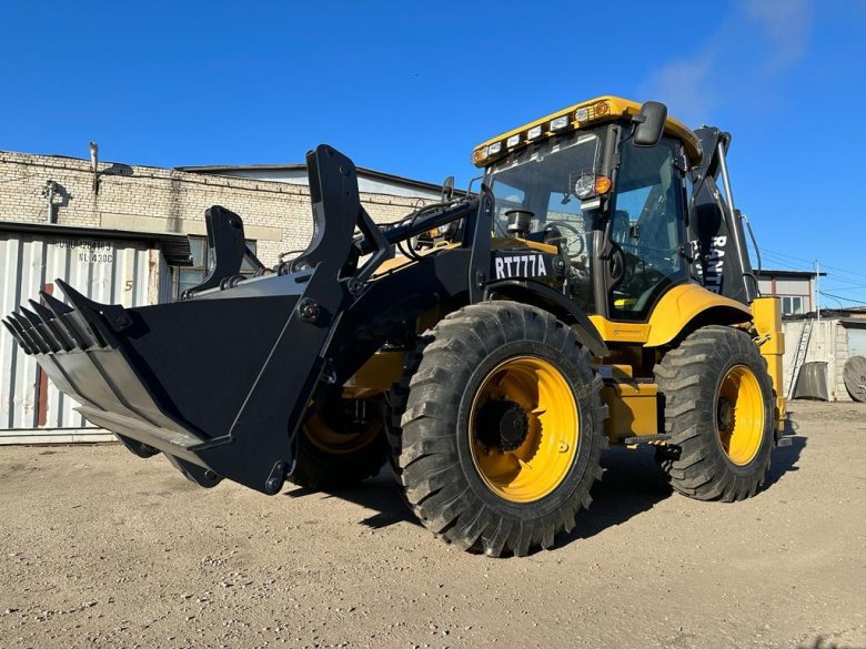 Равноколесный экскаватор погрузчик