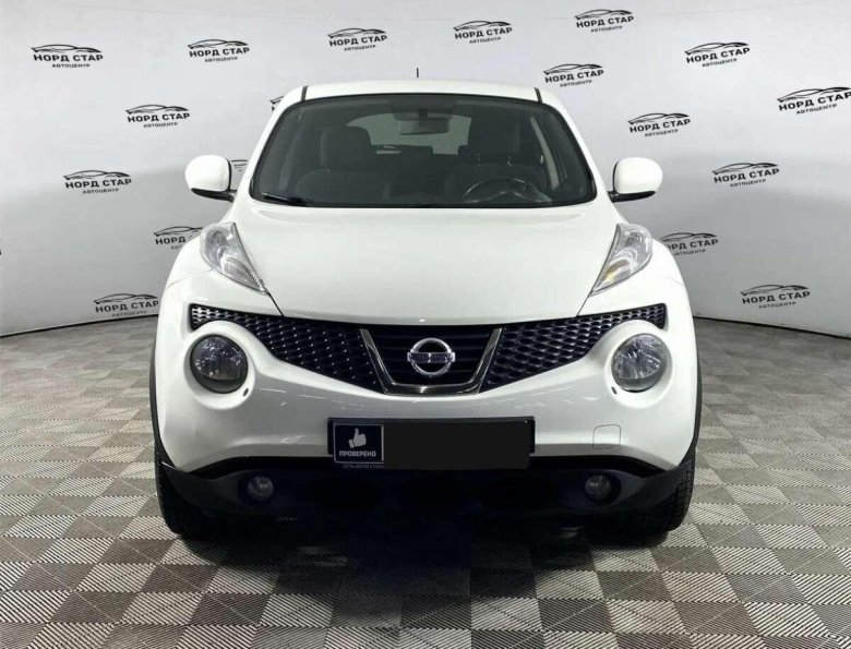 Ниссан жук 2014 белый