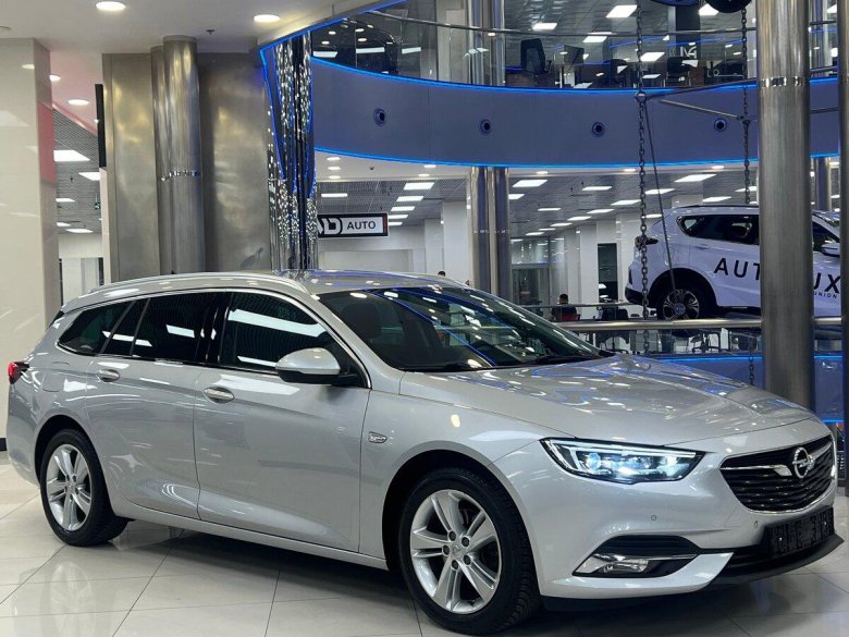 Опель инсигния универсал