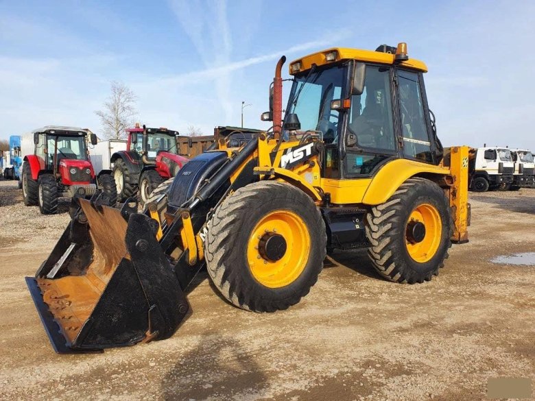 MST 544 экскаватор погрузчик