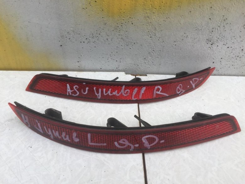 Катафот заднего бампера Опель Астра j