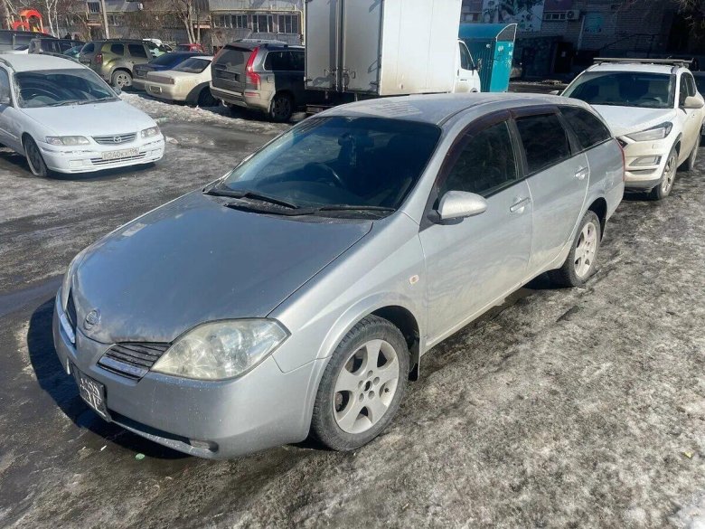 Ниссан примера 2001