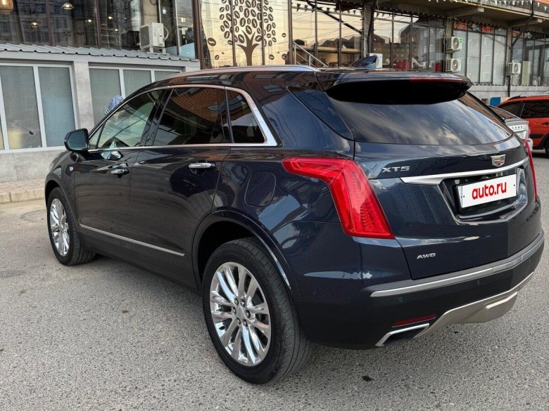 Кадиллак машина хт5