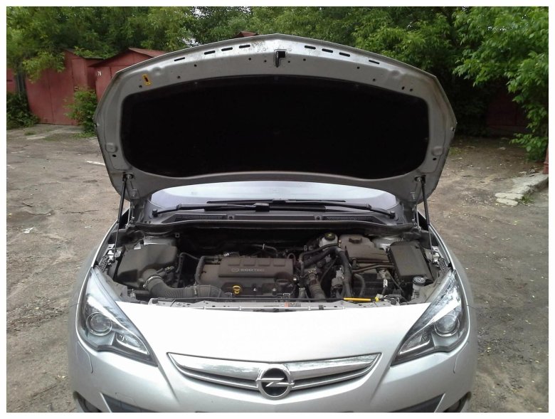 Газовые упоры на капот на Opel Astra j