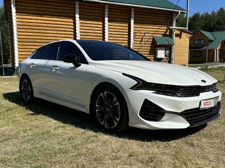 Белая киа к 5