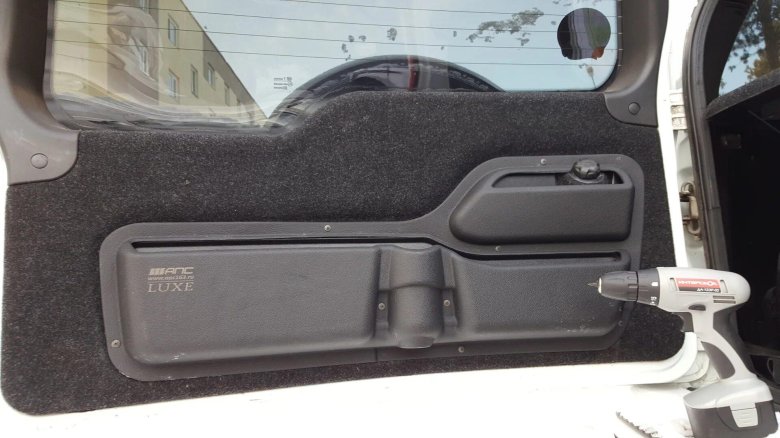 Карман пятой двери Chevrolet Niva