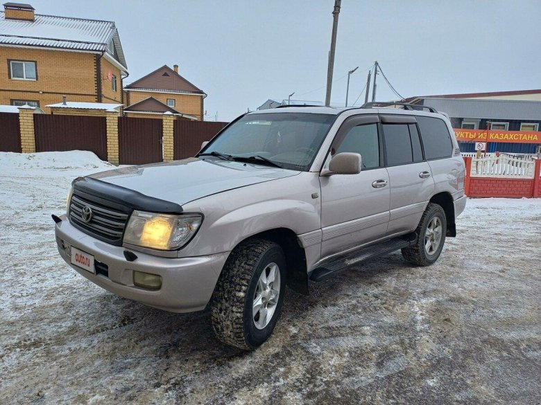 Тойота ленд крузер 100 серебристый