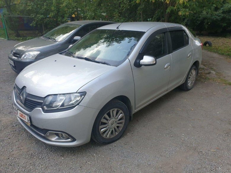 Рено логан 2014 года серебристый