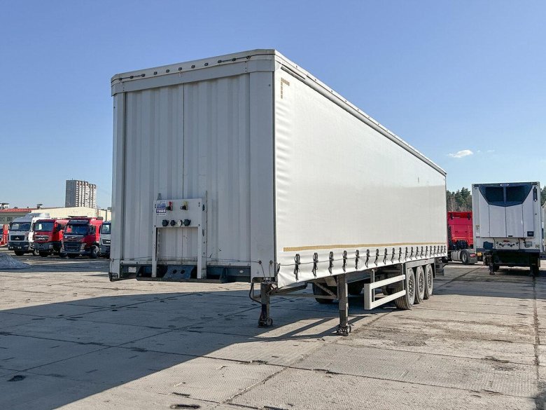 Шторно-бортовой полуприцеп krone