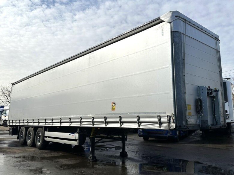 Шторный полуприцеп шмитц