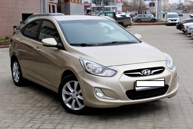 Хендай Солярис золотистый