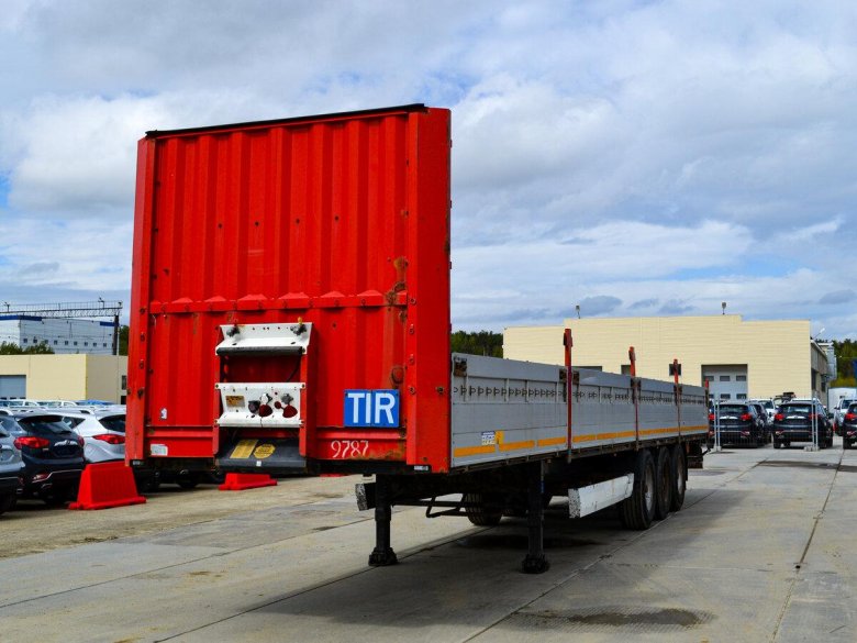 Бортовой полуприцеп манак авто