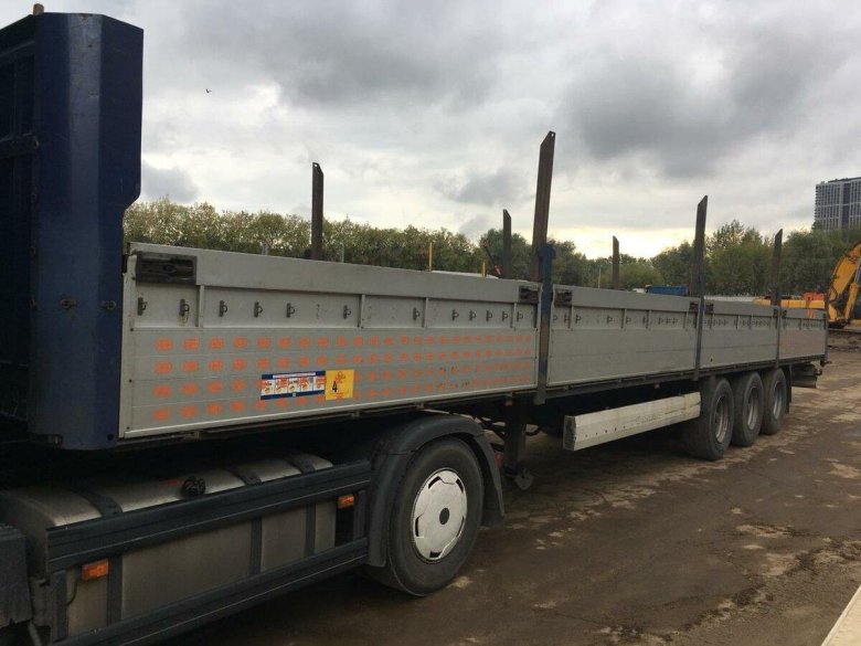 Полуприцеп бортовой Krone SD