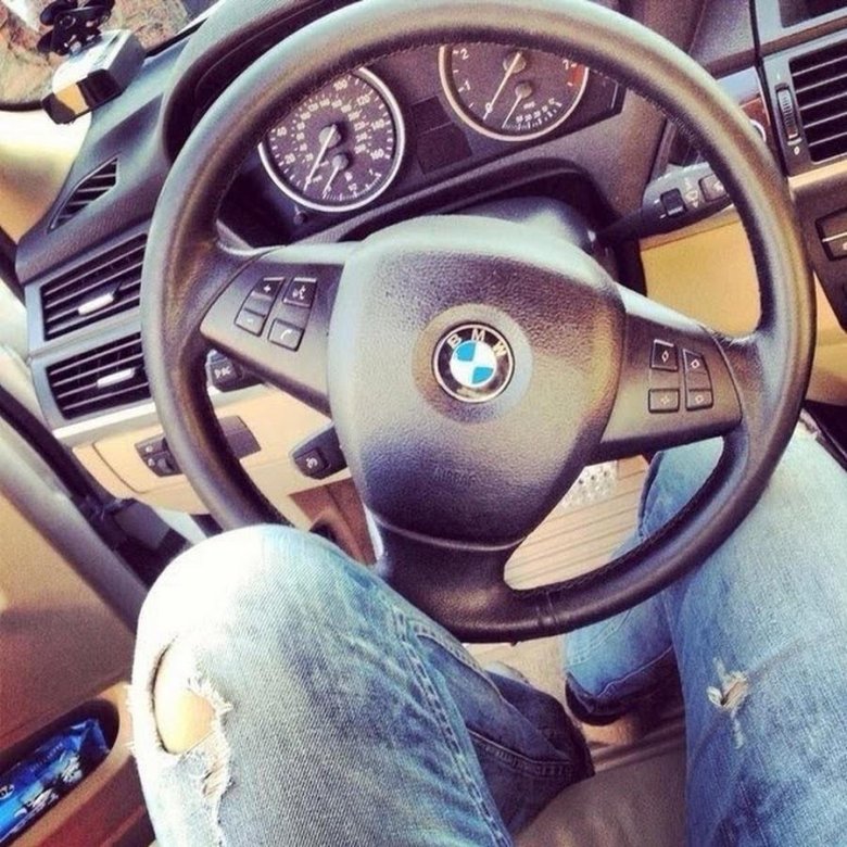 За рулем БМВ х5