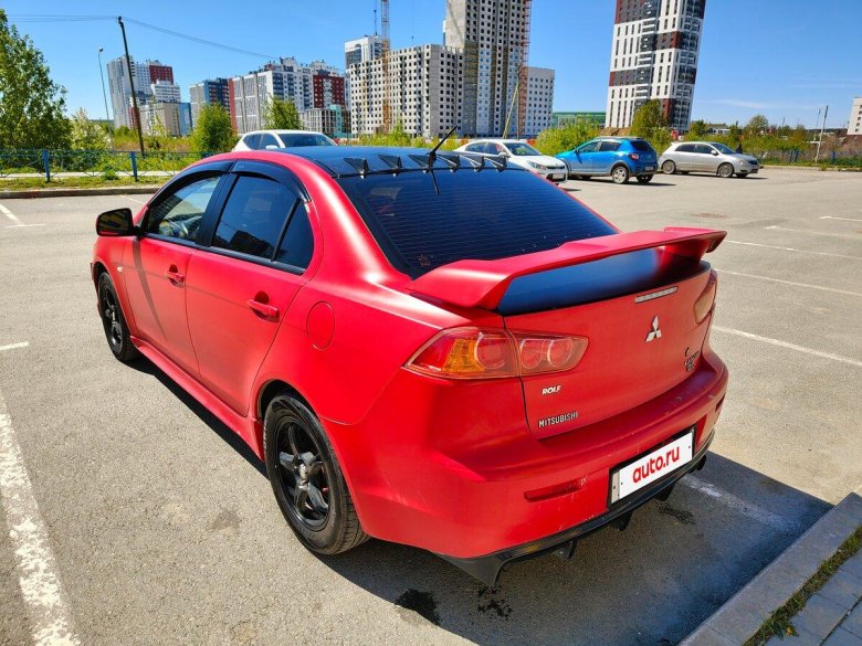 Митсубиси лансер 10 красный со спойлером