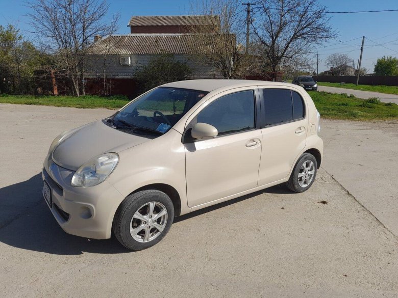 Тойота пассо 2011 год