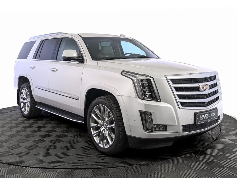 Белый кадиллак эскалейд