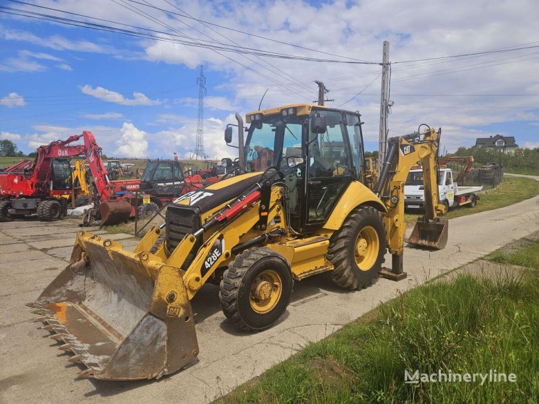 Экскаватор погрузчик катерпиллер 428 е