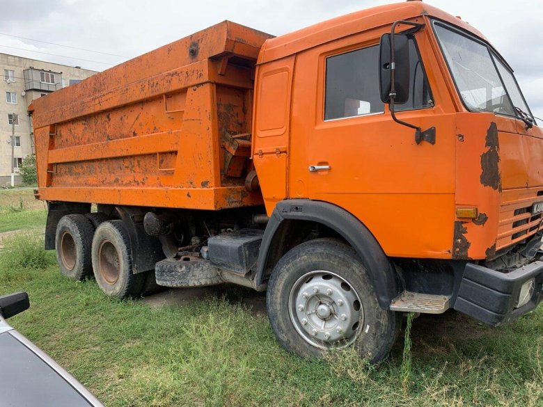 Камаз оранжевый 65115 самосвал