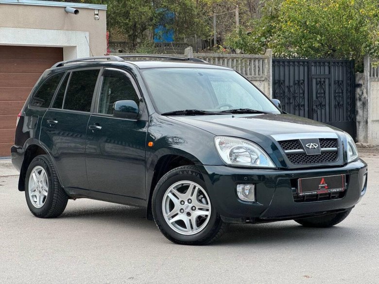 Тигго зеленая решетка