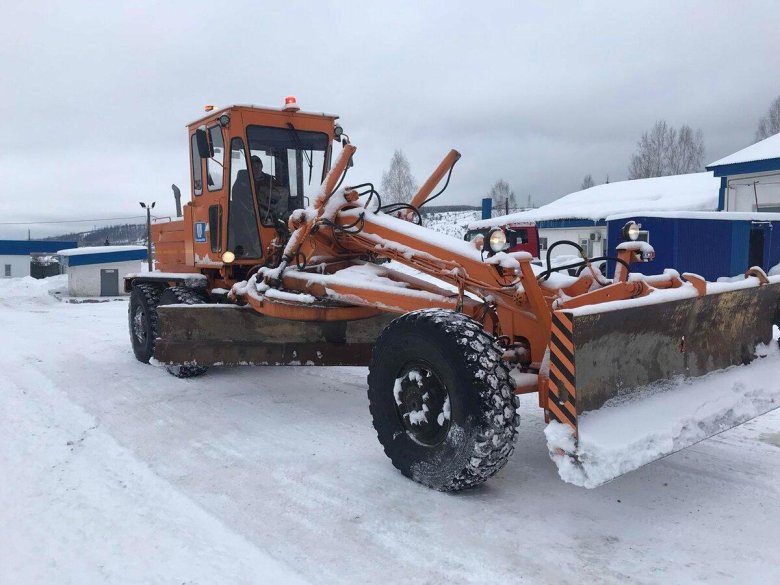 Оранжевый грейдер с серой кабиной