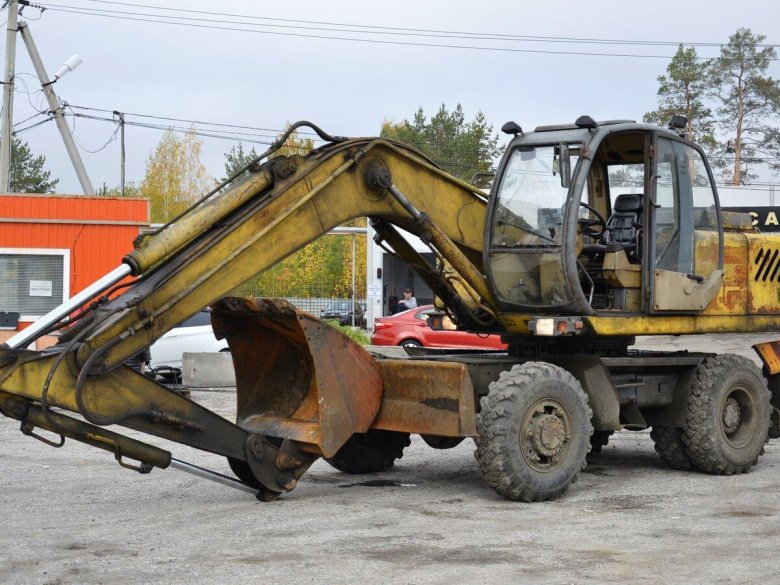 Колесный экскаватор твэкс ек12