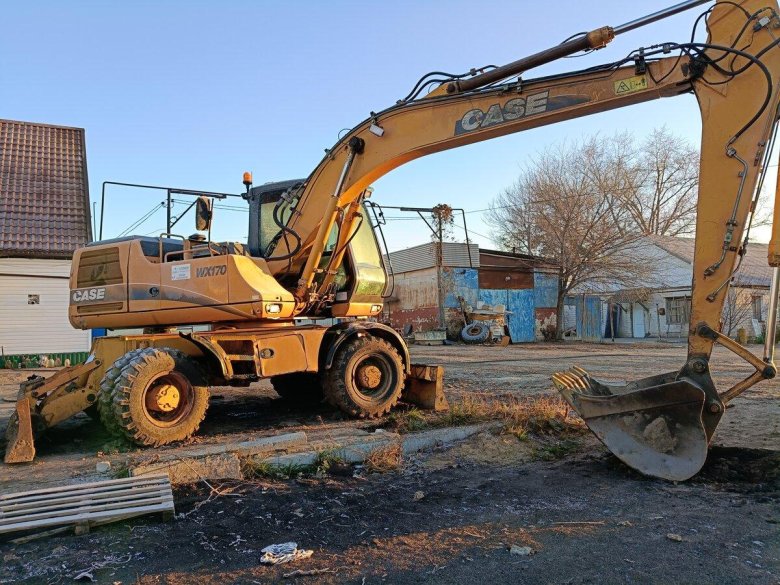 Экскаватор case