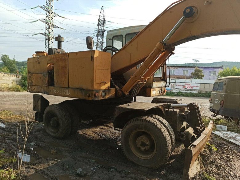 Колесный экскаватор твэкс ек12