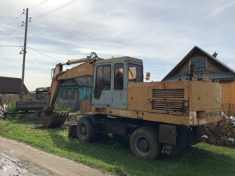 Экскаватор колесный эо