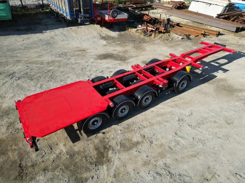 Полуприцеп контейнеровоз саморазгружающийся