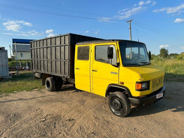 Мерседес бортовой грузовик желтый