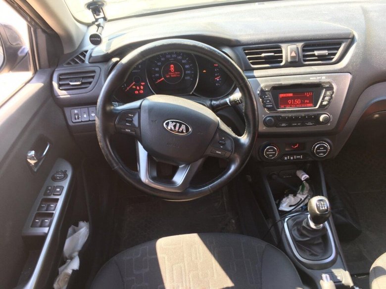 Киа Рио 2014 года комплектации Престиж