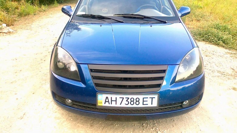 Решетка радиатора чери Фора