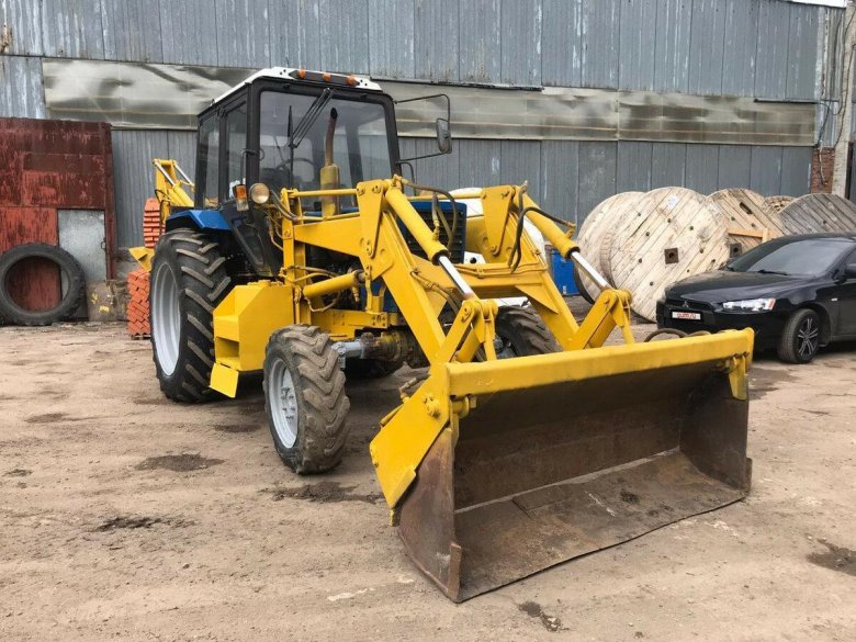 Экскаватор-погрузчик «амкодор 702е