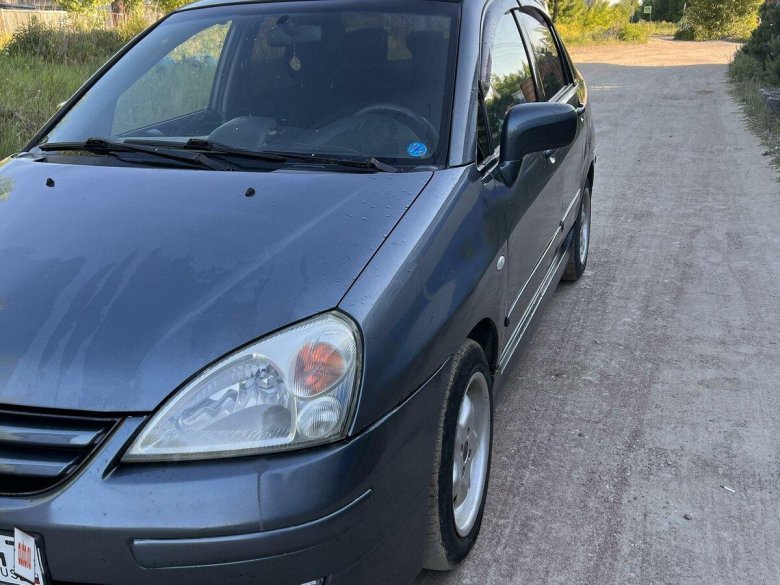 Suzuki Aerio часы