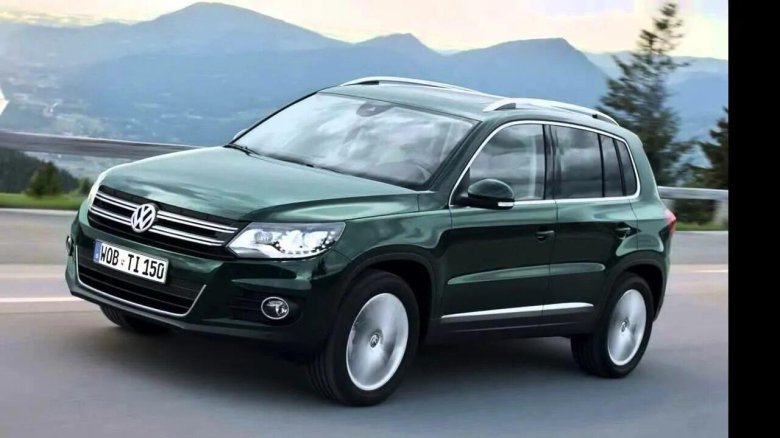 Фольксваген Тигуан темно зеленый