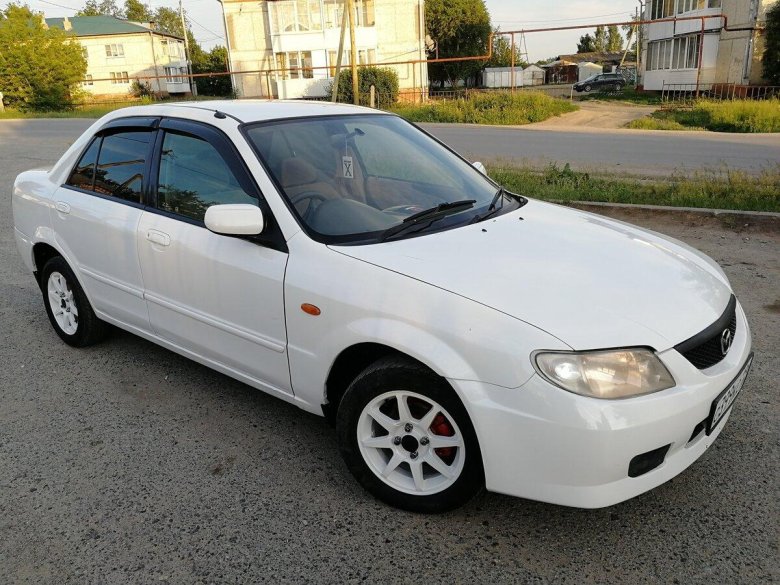 Мазда фамилия 2003 седан