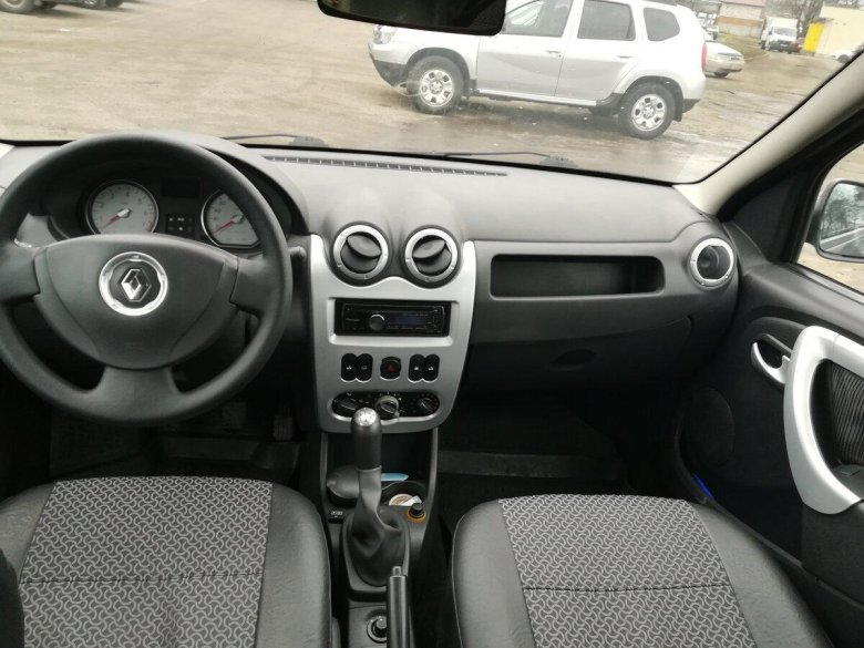 Рено Логан 1 Рестайлинг 1.6 102 л.с салон