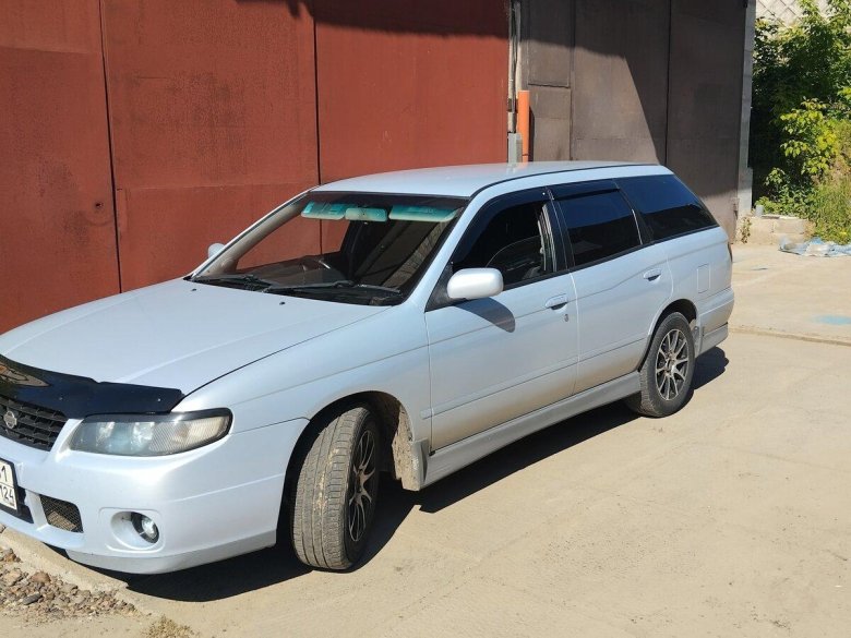 Ниссан авенир 2001