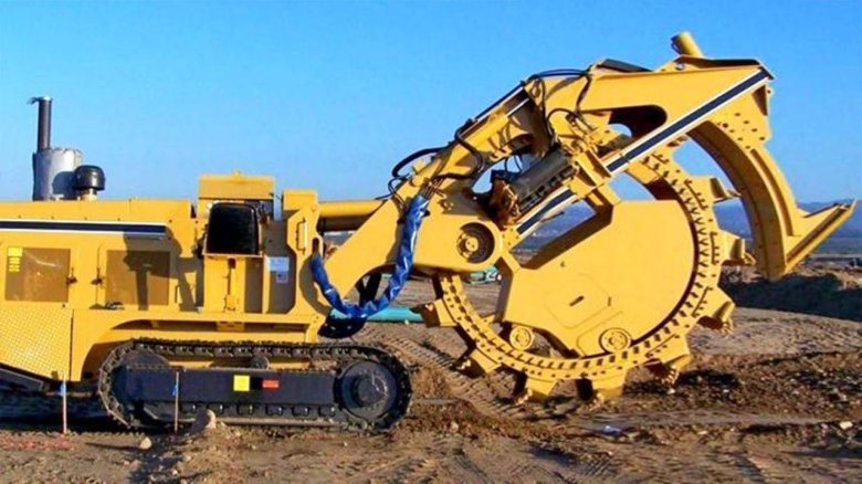 Роторный траншейный экскаватор