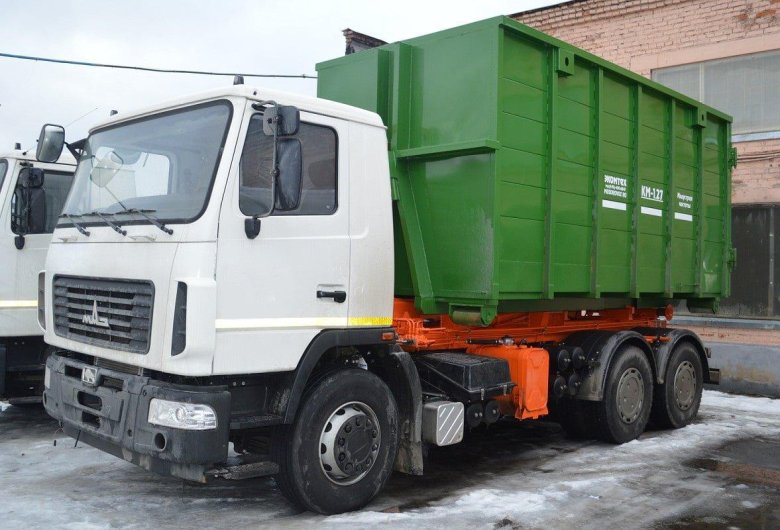 Маз мусоровоз с боковой загрузкой