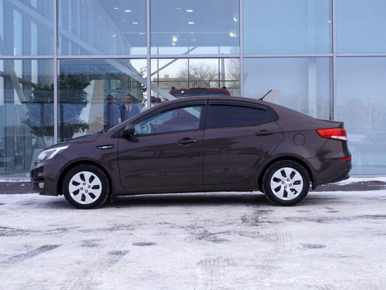 Коричневый киа рио