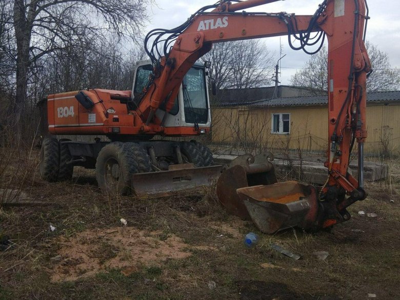 Экскаватор колесный полноповоротный