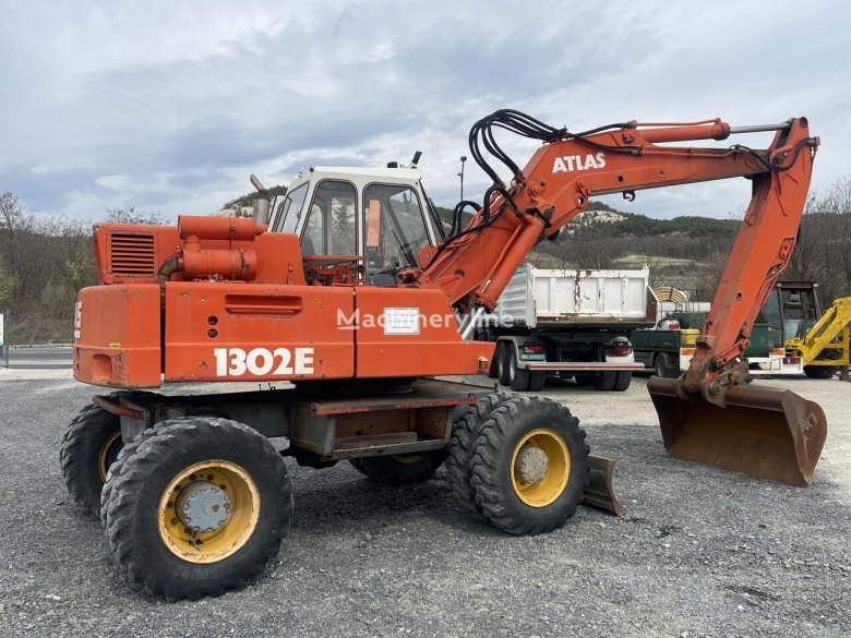 Экскаваторы атлас 1204