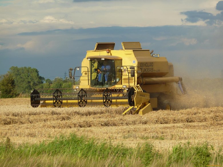 Комбайн New Holland tx65